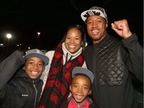 Ottawa Redblacks quarterback and Grey Cup champion Henry Burris arrived in Ottawa by train on Monday with his wife, Nicole, and sons Armand, 10, and Barron, 7. (Julie Oliver, Postmedia)
