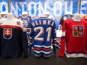 A Ivan Hlinka hockey jersey (centre) on display during a press conference where it was announced that Edmonton will host the Ivan Hlinka Memorial Cup hockey tournament in 2018, 2020, and 2022, in Edmonton on Monday Nov. 28, 2016. Photo by David Bloom