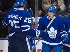 Toronto Maple Leafs forwards Mitchell Marner (left) and James van Riemsdyk celebrate a goal. (CRAIG ROBERTSON/Toronto Sun files)