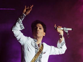 In this April 26, 2008 file photo, Prince performs during the second day of the Coachella Valley Music and Arts Festival in Indio, Calif. Paisley Park will host a four-day celebration of the "Purple Rain" megastar's life next year. "Celebration 2017" will be held April 20-23 during the anniversary of his death. Prince was found dead at his home on April 21, 2016, in suburban Minneapolis. He was 57. (AP Photo/Chris Pizzello, File)