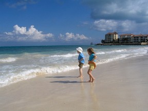 Kids play in the surf in the Bahamas. (Darren Francey/Postmedia Network file photo)