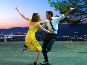 Emma Stone and Ryan Gosling dance in a scene from La La Land. (Handout Photo)