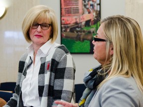 SWHPCW lead Mary Cardinal, left, looks on as Lisa Penner, also with SWHPCW, reassures Huron County council that the network is not asking the mayors to fund a significant portion of hospice beds coming to Huron-Perth. (Darryl Coote/The Goderich Signal Star)