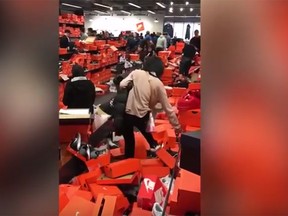 Black Friday shoppers trashed a Nike Factory Outlet near Seattle, Wash. (YouTube)