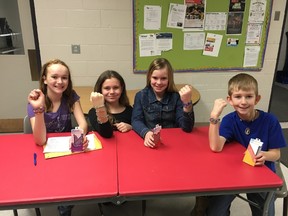 Pictured from left to right are Evergreen Elementary School students Macey Mulligan, Tyla Perley, Presley Elliot, and Tailer Chase who are all part of the school’s Youth Action Team. These students sell bracelets as part of their We Are Rafiki fundraiser.