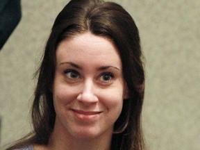 In this July 7, 2011 file photo, Casey Anthony smiles before the start of her sentencing hearing in Orlando, Fla. Her former lawyer, Todd Macaluso, has been busted in a massive cocaine conspiracy. (AP Photo/Joe Burbank, File)