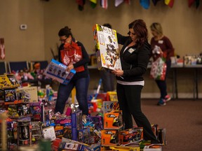 Volunteers pack Christmas Hamper's on Dec. 18, 2015. 

Whitecourt Star file photo