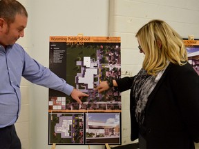 Principal Andy Parnham and Acting Vice-Principal for South Plympton/Wyoming and South Plympton Campus DeeAnna Smith have a look at the enhancements proposed for Wyoming Public School. The board has yet to decide on a name for the consolidated school. (Melissa Schilz/Postmedia Network)