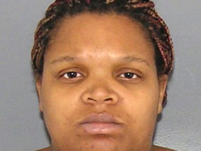 This undated booking photo provided by the Hamilton County Sheriff's Office in Cincinnati shows Andrea Bradley, the mother of a 2-year-old Ohio girl who died in March 2015 after she was starved and beaten. A psychologist's report found Bradley is intellectually disabled, and a judge ruled Tuesday, Nov. 29, 2016, that she cannot be sentenced to death if convicted of aggravated murder in the death of her daughter Glenara Bates. The judge set Bradley's trial for April 2017, and she could be sentenced to up to life in prison if convicted. Glenara's father Glen Bates was convicted of aggravated murder on Sept. 26, 2016, and sentenced to death on Oct. 17, 2016. (Hamilton County Sheriff's Office via AP, File)