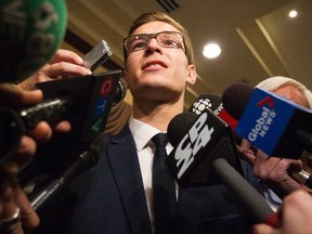 19-year-old Progressive Conservative candidate Sam Oosterhoff speaks to members of the media following his victory in the byelection in Niagara-West Glanbrook November 17, 2016. (THE CANADIAN PRESS/Aaron Lynett)