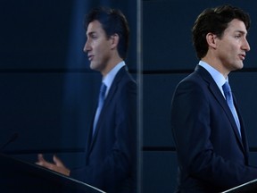 Prime Minister Justin Trudeau holds a press conference at the National Press Theatre in Ottawa on Tuesday, Nov. 29, 2016. Trudeau is approving Kinder Morgan's proposal to triple the capacity of its Trans Mountain pipeline from Alberta to Burnaby, B.C. ‚Äî a $6.8-billion project that has sparked protests by climate change activists from coast to coast. THE CANADIAN PRESS/Sean Kilpatrick