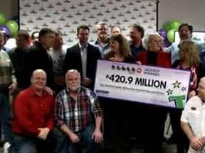 Co-workers at a metal manufacturing plant will split a Powerball jackpot of nearly $421 million.
