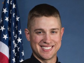 This undated image provided by the Ohio State University Police shows officer Alan Horujko.