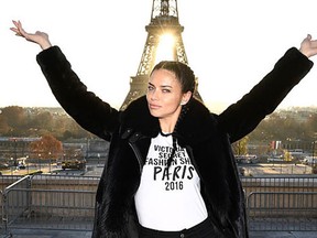 Adriana Lima poses in front of the Eiffel Tower prior the 2016 Victoria's Secret Fashion Show on November 29, 2016 in Paris, France. (Photo by Dimitrios Kambouris/Getty Images for Victoria's Secret)