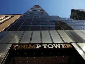 Trump Tower stands along 5th Avenue in Manhattan. On Wednesday, President-elect Donald Trump said he's leaving his business empire to focus on his upcoming presidency. (Spencer Platt/Getty Images)