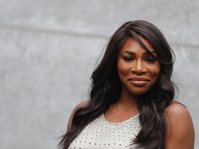 In this Sept. 23, 2016, file photo, U.S. tennis star Serena Williams poses for photographers prior to the start of the Giorgio Armani women's Spring-Summer 2017 fashion show, that was presented in Milan, Italy. (AP Photo/Luca Bruno, File)