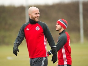 Toronto FC midfielder Michael Bradley and forward Sebastian Giovinco warm up during practice ahead of the second leg of the MLS Eastern Conference final against the Montreal Impact in Toronto on Nov. 29, 2016. (THE CANADIAN PRESS/Nathan Denette)