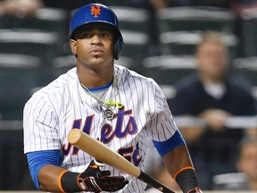 In this Sept. 20, 2016, file photo, New York Mets' Yoenis Cespedes reacts after striking out swinging for the final out in the Mets' 5-4 loss to the Atlanta Braves in a baseball game in New York. (THE CANADIAN PRESS/AP/Kathy Willens)