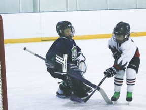 Vulcan novice player Dryden Scobie scores during a shootout against Claresholm at the Vulcan District Arena. Jasmine O'Halloran Vulcan Advocate