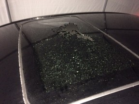 A Lively family is raising safety concerns after debris from a Highway 17 bridge spanning Main Street punctured a hole in the sunroof of their vehicle on Monday. A piece of broken glass nicked the neck of their nine-year-old daughter. (Photo supplied)