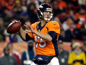 Broncos quarterback Trevor Siemian looks to pass against the Chiefs during the first half of an NFL game in Denver on Sunday, Nov. 27, 2016. (Jack Dempsey/AP Photo)