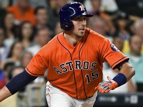 The Minnesota Twins have signed former Houston Astros catcher Jason Castro to a three-year contract worth $24.5 million. The deal was agreed to last week and finalized Wednesday, Nov. 30, 2016. (AP Photo/Eric Christian Smith, File)