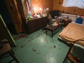 Blood stains the floor of a basement bedroom at 717 Adelaide St. in London, Ont. on Wednesday November 30, 2016. Derek Ruttan/The London Free Press/Postmedia Network