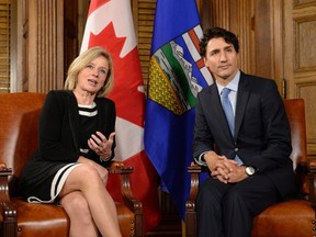 Prime Minister Justin Trudeau and Alberta Premier Rachel Notley speak during a meeting on Parliament Hill, Tuesday, Nov. 29, 2016 in Ottawa. THE CANADIAN PRESS/Justin Tang