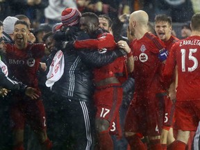 Toronto FC celebrate a second-half goal against the Montreal Impact during the MLS Conference Finals, Game 2 at BMO field in Toronto on Wednesday November 30, 2016. (Dave Abel/Toronto Sun/Postmedia Network)