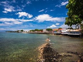 This undated photo provided by the Hawaii Tourism Authority shows a waterfront view of Front Street in Lahaina, Maui, Hawaii. Front Street is Lahaina's main downtown street, home to small businesses and opportunities for sightseeing and people-watching. (Tor Johnson/Hawaii Tourism Authority via AP)