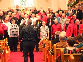 The director of the Seaforth Harmony Kings, Dave Campbell instructs the numerous groups of barbershops from the area in the Western Division Barbershop Christmas Show last week.(Shaun Gregory/Huron Expositor)