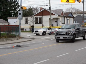 Police at the scene of a fatal pedestrian collision at Cosburn and Cedarvale Aves. in Toronto on Dec. 1, 2016. (Victor Biro/Special to the Toronto Sun)