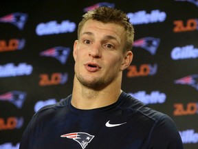 Patriots tight end Rob Gronkowski is having surgery for a herniated disk in his back, a person with knowledge of the details tells The Associated Press. (Steven Senne/AP Photo/Files)