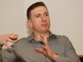 Former OHL player Brock McGillis speaks to a group of students at Lasalle Secondary School in Sudbury on in December. John Lappa/Sudbury Star