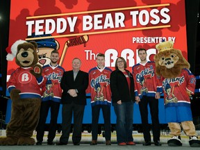 The Edmonton Oil Kings hockey club unveiled the jerseys they will be wearing when thousands of stuffed teddy bears will fly over the glass at Rogers Place at the launch of the team's 10th Annual Teddy Bear Toss. At Rogers Place on December 1, 2016 for the unveiling were (left to right) Brickley the Bear (The Brick mascot), Edmonton Oil Kings Aaron Irving, Dave Freeman (President, The Brick), Edmonton Oil Kings Patrick Dea, Lana Nordlund (Executive Director, Santas Anonymous), Edmonton Oil Kings Tyler Robertson and Louie the Lion (Edmonton Oil Kings mascot). (Larry Wong)