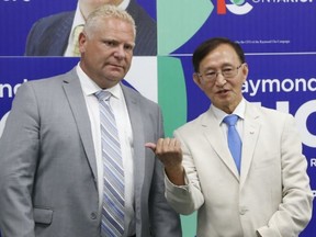 Doug Ford, left, and Raymond Cho (Toronto Sun files)