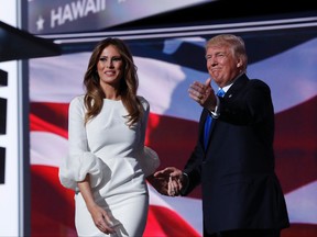 In this July 18, 2016, file photo, Melania Trump, wife of Republican Presidential Candidate Donald Trump walks to the stage as Donald Trump introduces her during the opening day of the Republican National Convention in Cleveland. Fashion designer Tom Ford said on ABC's "The View" Wednesday, Nov. 30, 2016, that he had had been asked to dress Mrs. Trump “quite a few years ago” and declined because “she’s not necessarily my image.” (AP Photo/Carolyn Kaster, File)