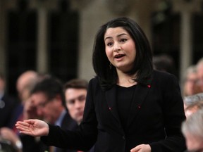 Maryam Monsef Minister of Demcratic Institutions stands in the House of Commons during question period in Ottawa, Friday, December 2, 2016. (THE CANADIAN PRESS/Fred Chartrand)