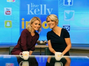 In this image released by Disney/ABC Home Entertainment and TV Distribution, host Kelly Ripa poses with guest co-host, Fox News' Megyn Kelly during the production of "LIVE Kelly" in New York on Wednesday, Nov. 9, 2016. (Pawel Kaminski/Disney/ABC Home Entertainment and TV Distribution via AP)