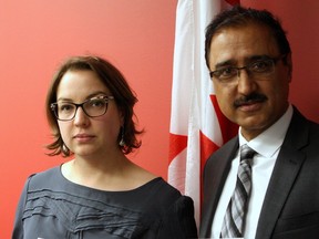Andrea Burkhart, executive director of the Action Coalition on Human Trafficking (ACT) Alberta Association, and Amarjeet Sohi, federal minister of Infrastructure and Communities, at the release of the first-of-its-kind in Canada Labour Trafficking in Edmonton: Holding Tight to a Double-Edged Sword on Dec. 2, 2016 highlighting issues that open foreign workers up to labour exploitation in Edmonton. CLAIRE THEOBALD/Postmedia