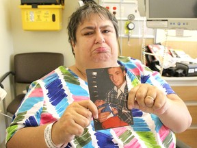 Michelle Turcotte holds a picture of her late husband, John, who died Nov. 3. He was 42. Turcotte is now staying at the North Bay Regional Health Centre until a bed becomes available at Cassellholme Home for the Aged.
Jennifer Hamilton-McCharles / The Nugget