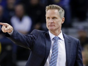 Warriors head coach Steve Kerr directs his team during first half NBA action against the Hawks in Oakland, Calif., on Monday, Nov. 28, 2016. (Marcio Jose Sanchez/AP Photo)