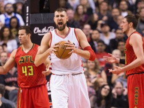 Raptors' Jonas Valanciunas reacts during first half NBA action against the Hawks at the Air Canada Centre in Toronto on Saturday, Dec. 3, 2016. (Stan Behal/Toronto Sun)