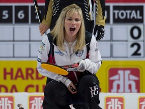 Jennifer Jones shouts to her sweepers during Canada Cup of Curling action in Brandon. (MICHAEL BURNS/Canadian Press)