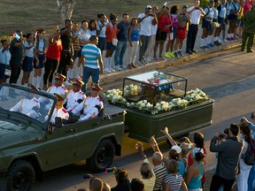 The motorcade carrying the ashes of the late Cuban leader Fidel Castro makes its final journey towards the Santa Ifigenia cemetery in Santiago, Cuba, Sunday, Dec. 4, 2016.  (AP Photo/Ramon Espinosa)