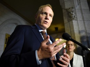 NDP MP Peter Julian speaks to reporters as he announces that he will step down as NDP House leader, on Parliament Hill, Wednesday, Oct. 19, 2016 in Ottawa. (THE CANADIAN PRESS/Justin Tang)