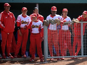 At least three members of the Cuban women's national baseball team, shown here at the IBAF Women's Baseball World Cup at John Fry Park in 2012, apparently defected during the event. (Larry Wong)