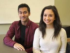 Fourth-year Queen's University physics students Saqeeb Hassan, left, and Nadia Bragagnolo. (Michael Lea/The Whig-Standard)
