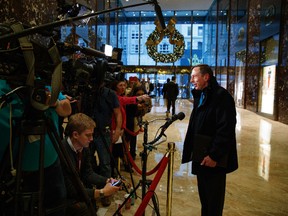Former CIA director retired Gen. David Petraeus arrives at Trump Tower talks with reporters after a meeting with President-elect Donald Trump, Monday, Nov. 28, 2016, in New York. (AP Photo/ Evan Vucci)