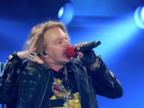 This file photo taken on May 13, 2016 shows US singer Axl Rose performing on stage with Australian band AC/DC on May 13, 2016 in Marseille, southern France.AFP PHOTO / BORIS HORVATBORIS HORVAT